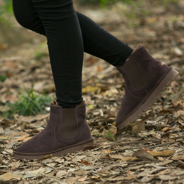 Ζεστές χειμωνιάτικες μπότες σε χρώματα χειμώνας