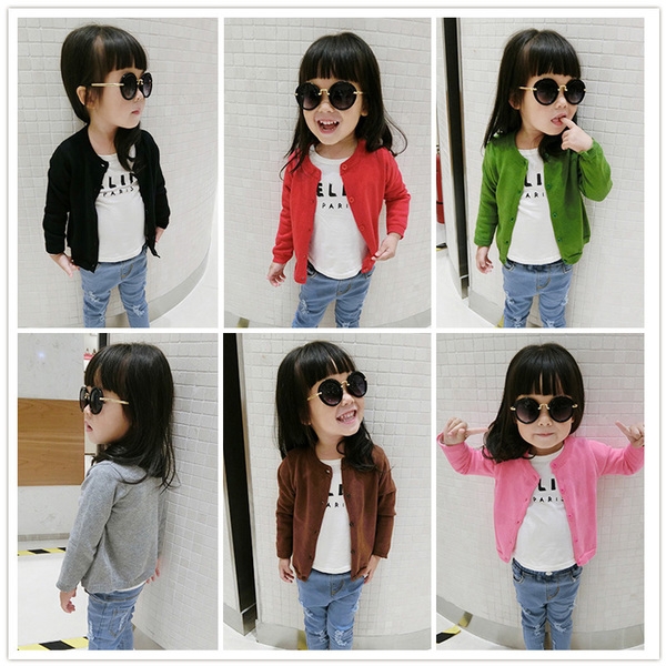 Детски жилетки за момичета с копчета в шест цвята. 