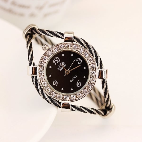 Елегантен дамски часовник подходящ за стилни дами- в сребърно, златно и черно. 