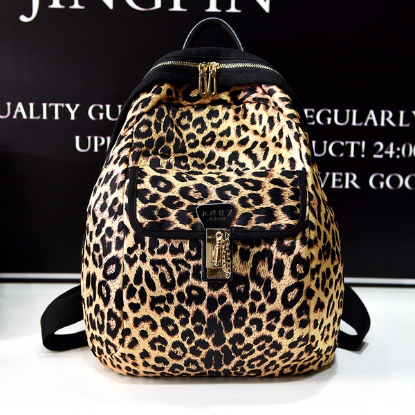 Дамска голяма раница в различни цветови гами с подарък портмоне