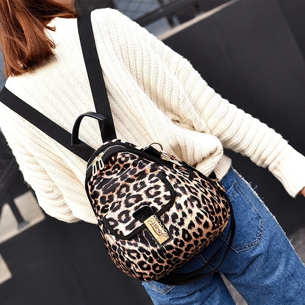 Дамска шарена раница в различни цветове с подарък портмоне от същия модел