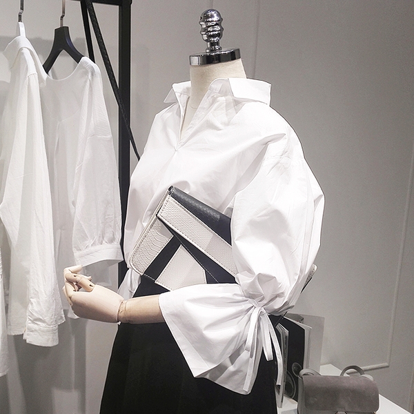 Дамска бонбонена риза в бял цвят подходяща за повод или ежедневие