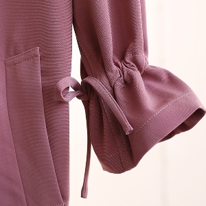 Μακρύ γυναικείο παλτό κομψό, με τσέπες και ζώνη σε ροζ και μπεζ χρώμα