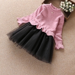 Παιδικό φόρεμα  με τούλι στο κάτω μέρος.