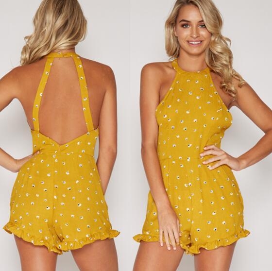 Οι γυναίκες το καλοκαίρι jumpsuit με φυτικά μοτίβα και κόβεται από το πίσω