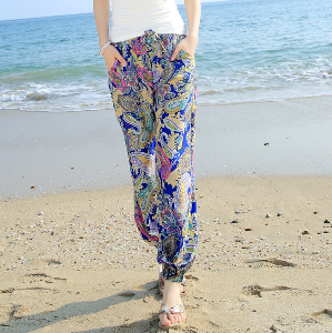 Дамски бохемски дълги и широки летни плажни панталони в два флорални модела с преобладяващо синьо или оранжево