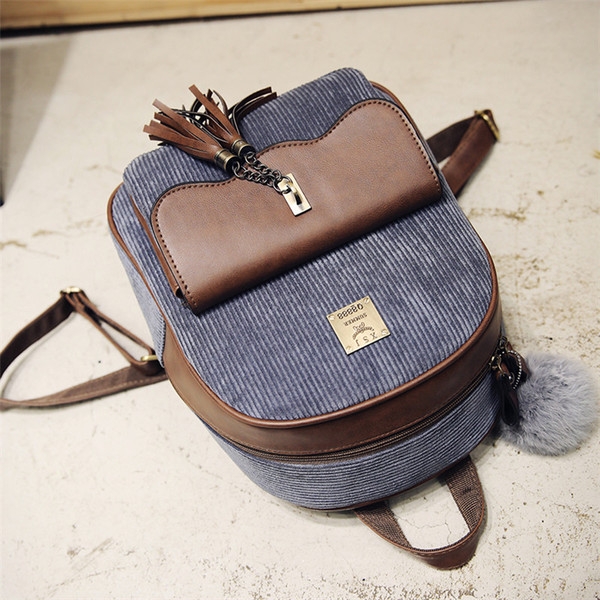 Κομψό κυρίες σακίδιο σε δύο χρώματα με ρουφηξιά.