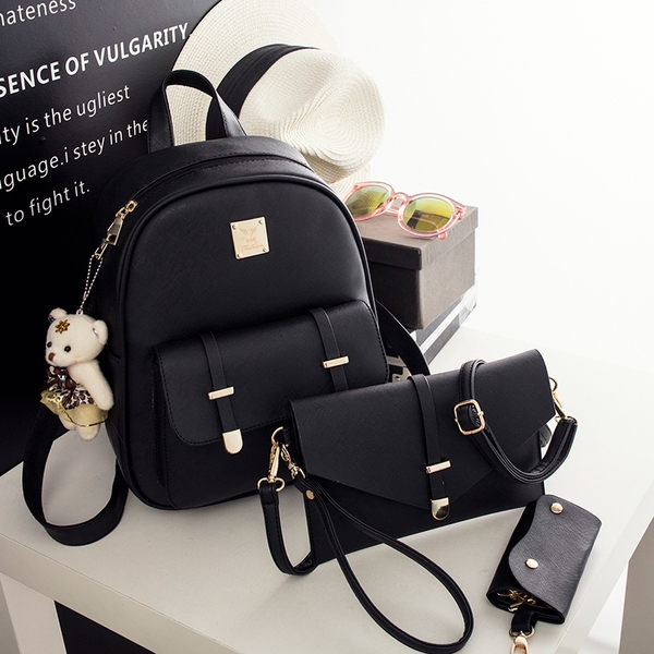 Οι γυναίκες σακίδια σε τρία φρέσκα tsvyata- μπλε, μαύρο και ροζ.