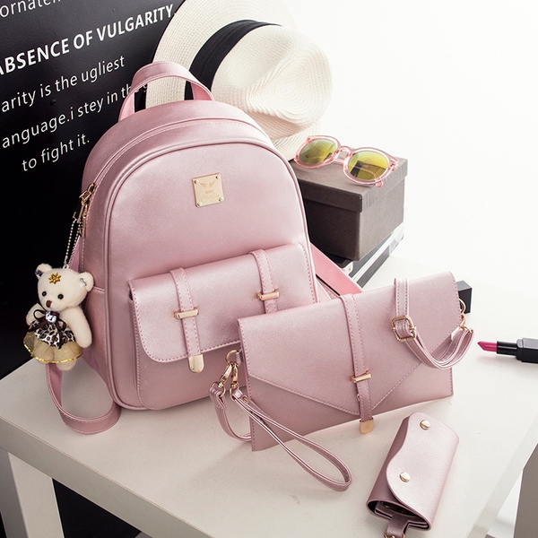 Οι γυναίκες σακίδια σε τρία φρέσκα tsvyata- μπλε, μαύρο και ροζ.