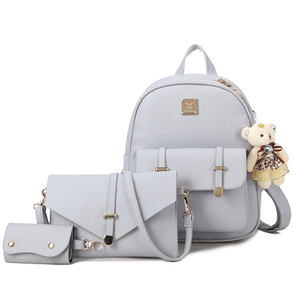 Οι γυναίκες σακίδια σε τρία φρέσκα tsvyata- μπλε, μαύρο και ροζ.