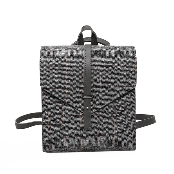 Елегантна дамска раница в сив цвят с дълги дръжки.