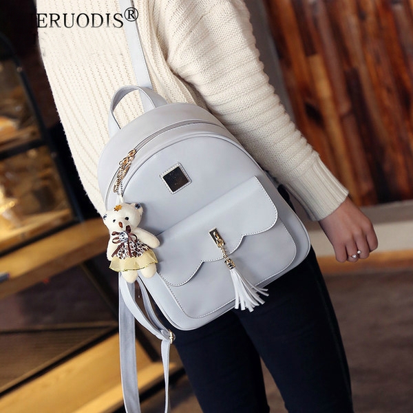 Γυναικείο σακίδιο με τα αξεσουάρ σε τρία χρώματα