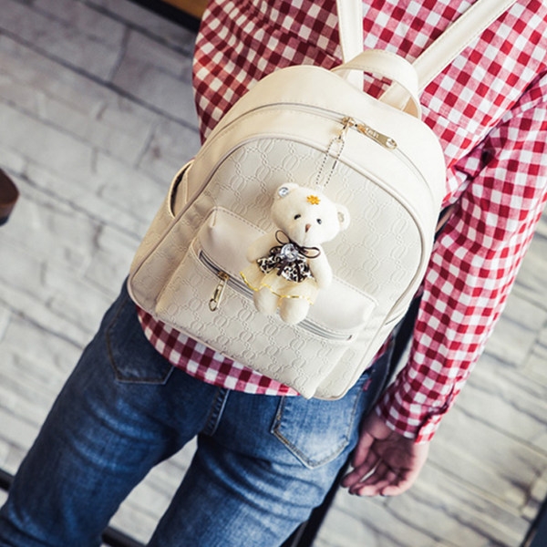 Γυναικείο σακίδιο σε δύο χρώματα με αξεσουάρ