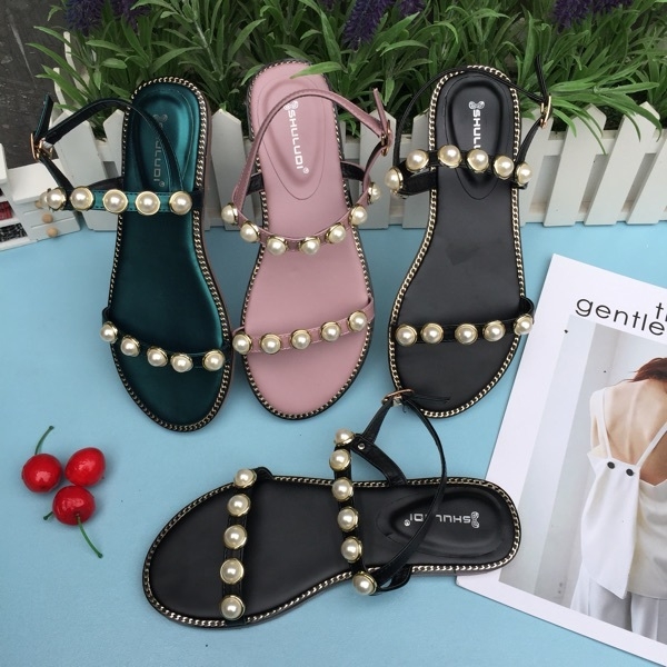 Οι γυναίκες σανδάλια με επίπεδη σόλα σε διάφορα χρώματα με μαργαριτάρια