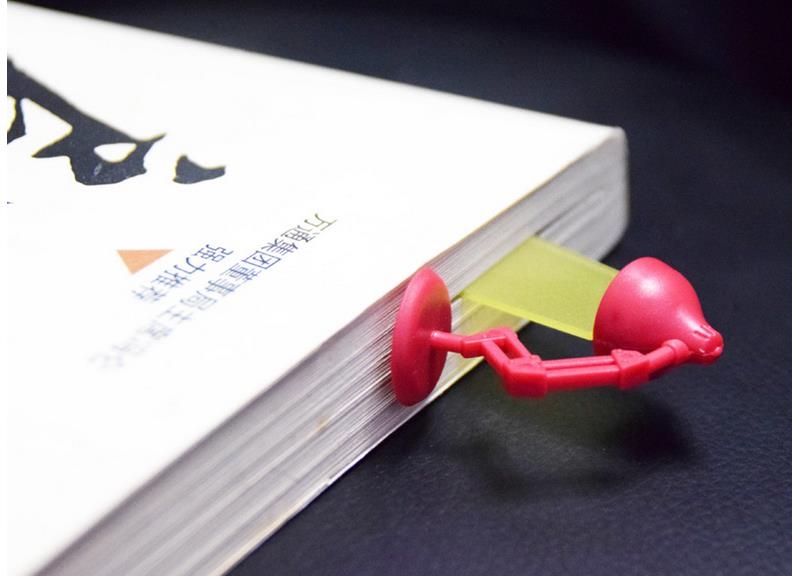 Интересен разделител за книги, `осветяващ` страницата, до която сте стигнали